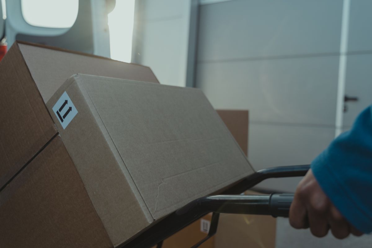 Parcels loaded on a trolley in a delivery van